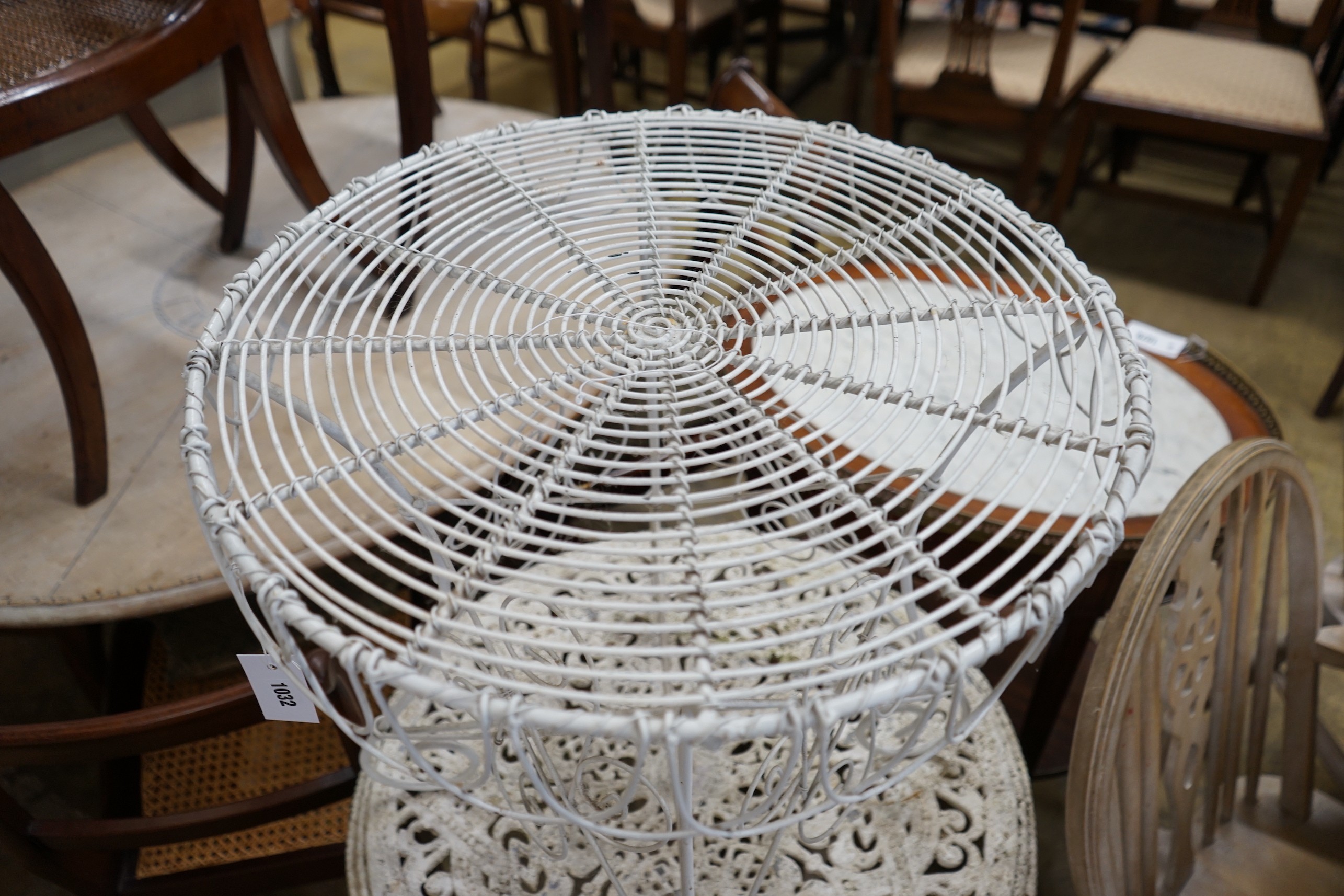 A painted wirework circular garden table and a painted aluminium garden table, larger diameter 60cm, height 70cm